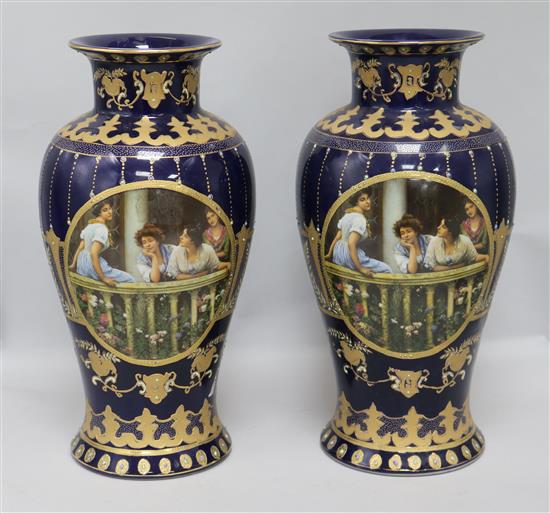 A pair of Vienna style vases